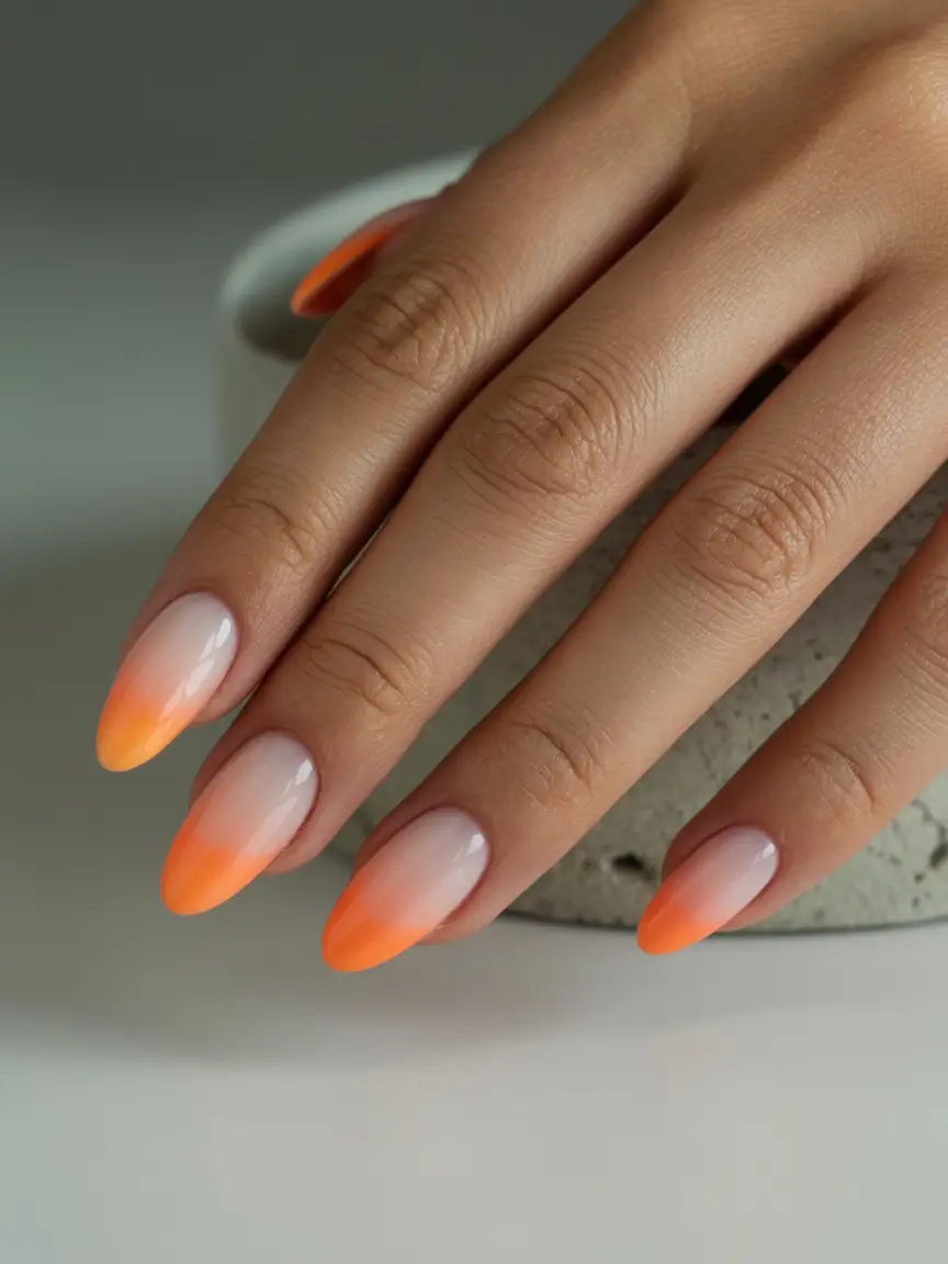 cute summer almond nails 2025 Sunset Fade in Neon Orange Ombre