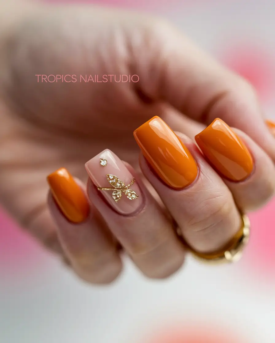 Glossy Gel Nails for Summer 2025 Tangerine Luxe with Butterfly Accent