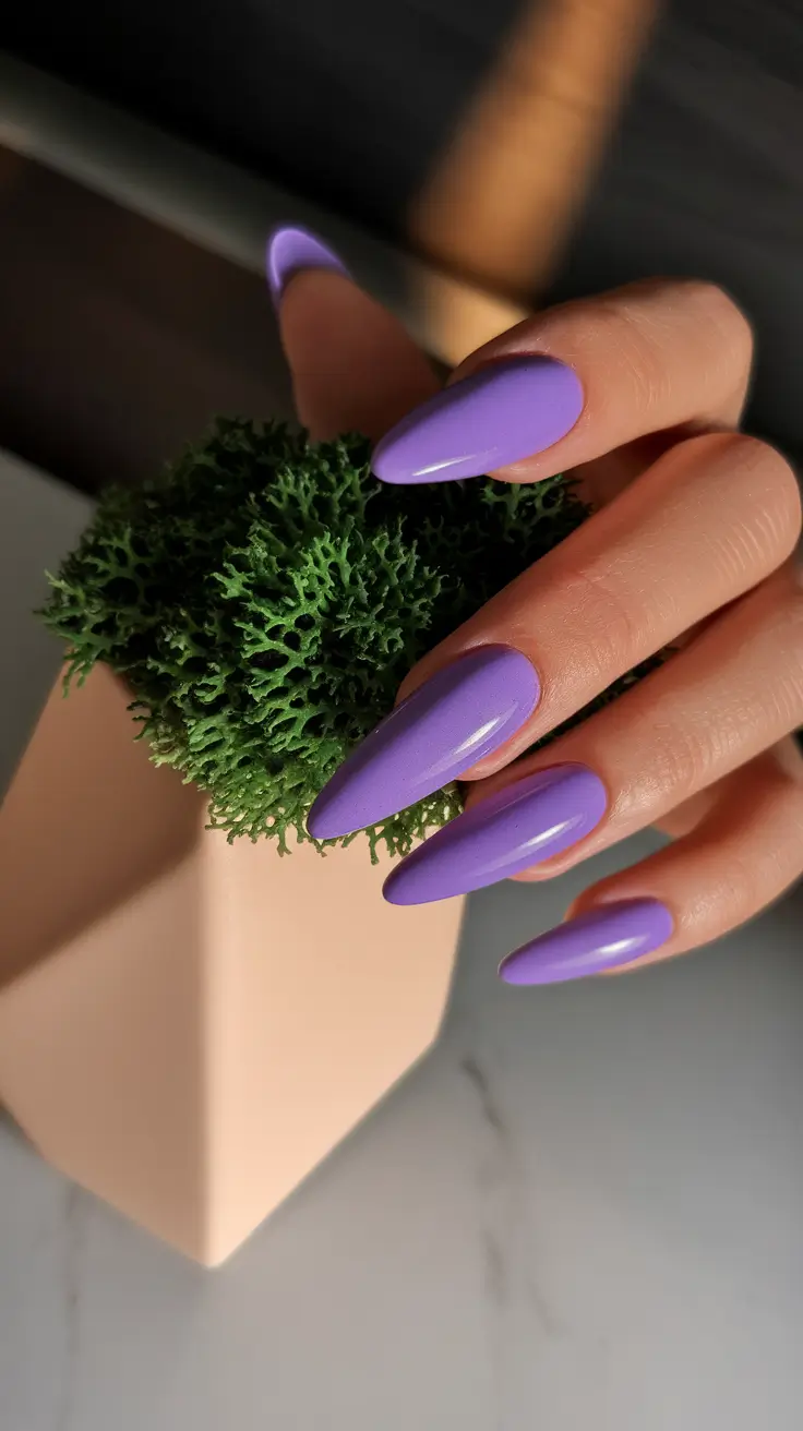 summer nail design ideas 2025 Bright Lavender Stiletto With a Glossy Finish