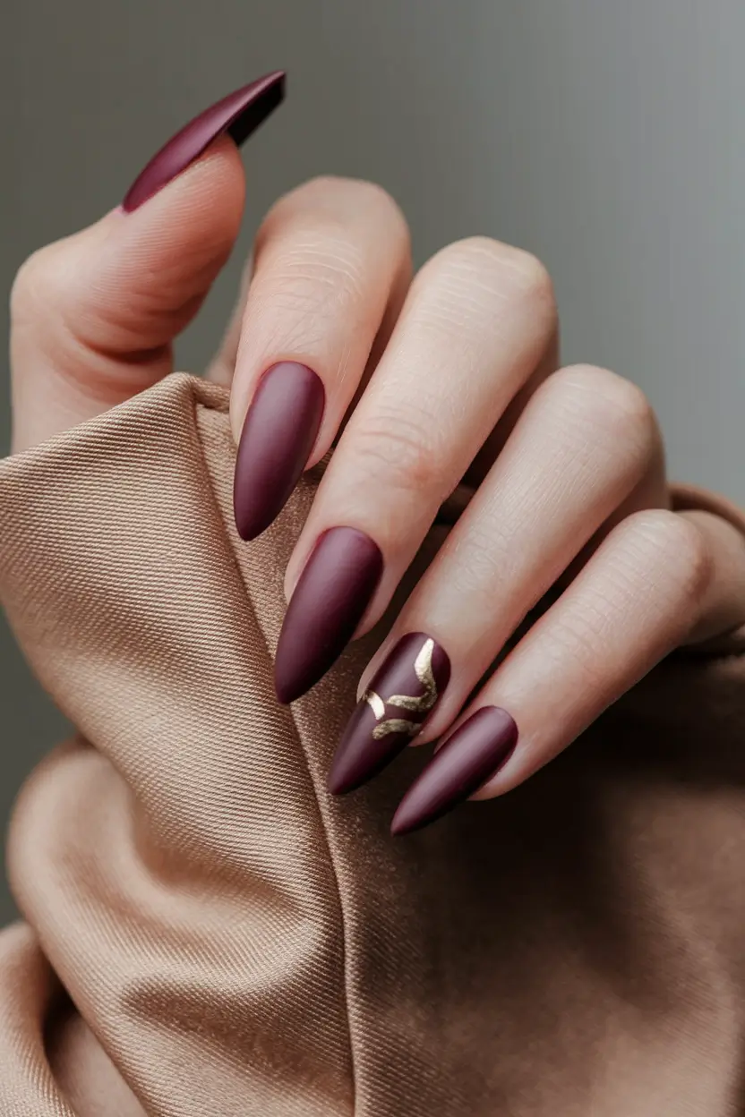 Best Fall Nail Colors for Fair Skin 2025 Matte Burgundy with Gold Detailing