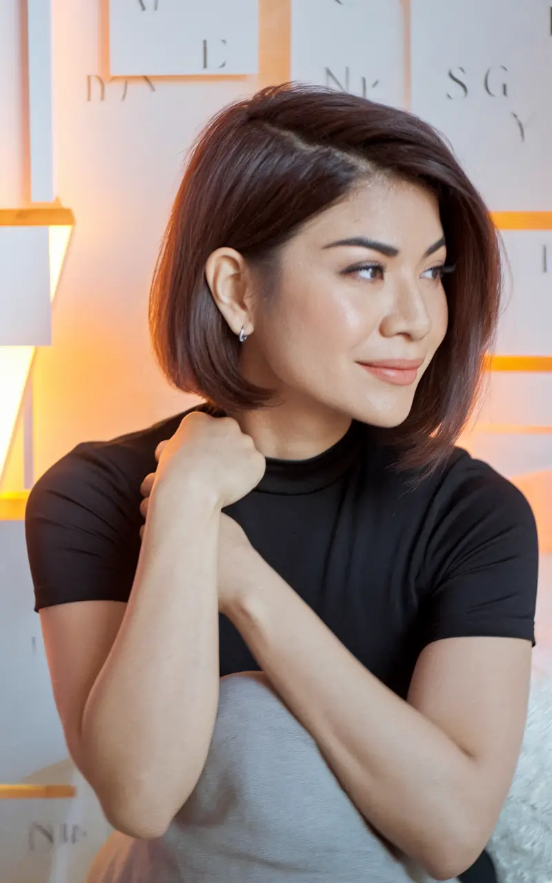 Best Short Haircut Ideas for Fall 2025 Structured Side-Part Bob with Auburn Depth