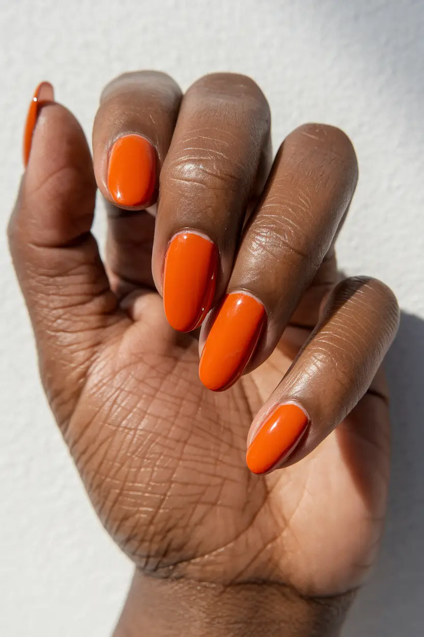 Fall 2025 Nail Colors for Brown Skin Mandarin Spice on Rounded Tips