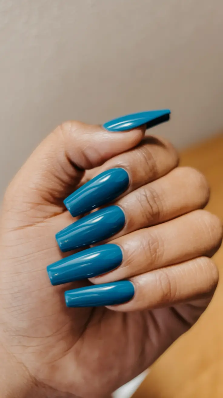 Fall 2025 Nail Colors for Brown Skin Peacock Teal in a Long Coffin Shape