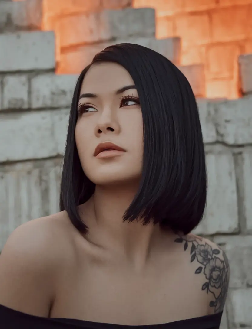 fall bob hairstyle ideas 2025 Angled Bob with a Jet Black Finish