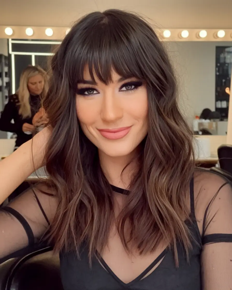 Fall hairstyle for Medium Hair 2025 - Feathered Shag with Curtain Bangs: Effortlessly Textured Layers