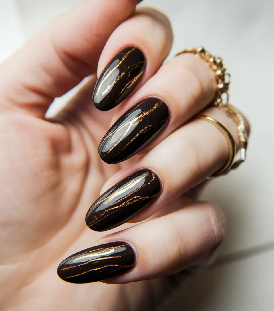 Fall Oval Nails 2025 - Oval Shape Ideas Glossy Black with Gold Veining