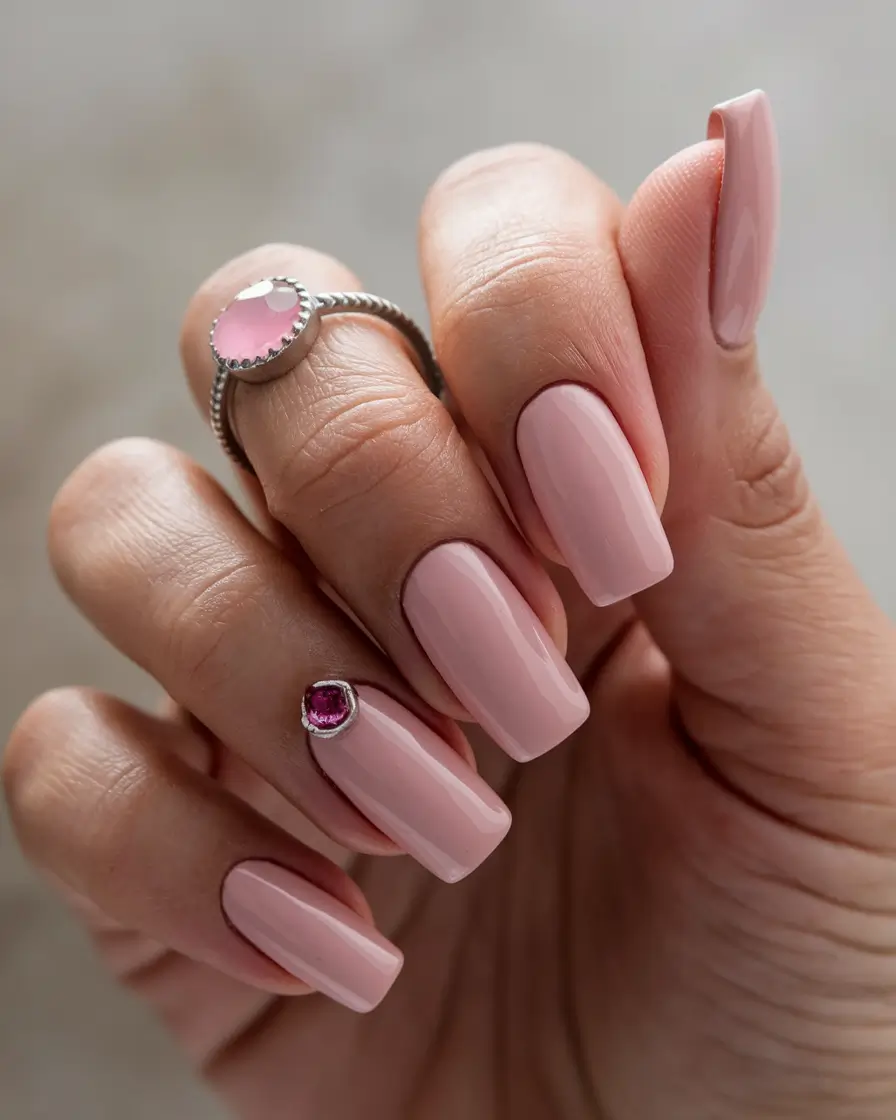 Latest Fall Nail Color Trends 2025 Classic Nude with Jewel Accent