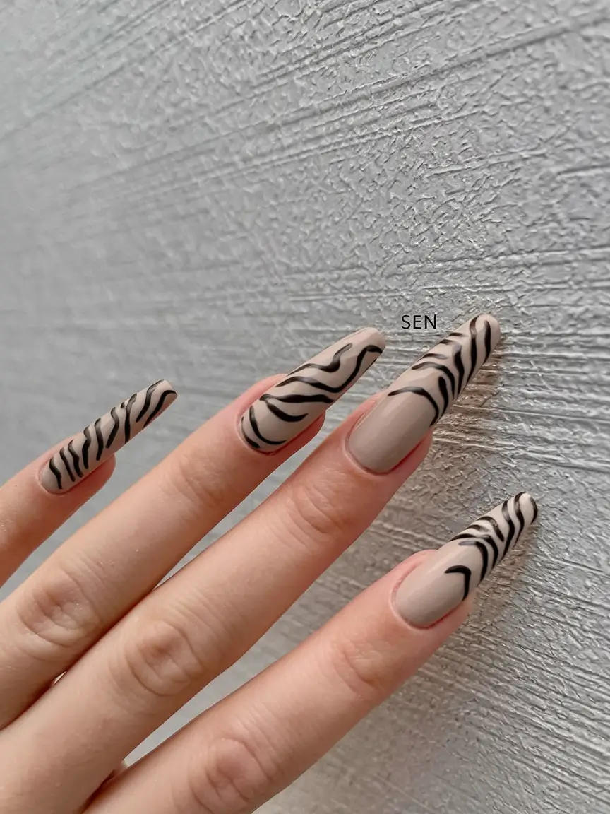 Long fall nails ideas 2025 Matte Nude and Black Zebra Coffin Nails