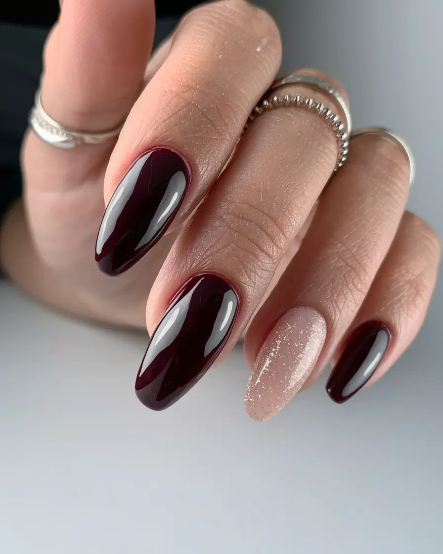 medium fall nails ideas 2025 Burgundy Almond with Nude Glitter Accent