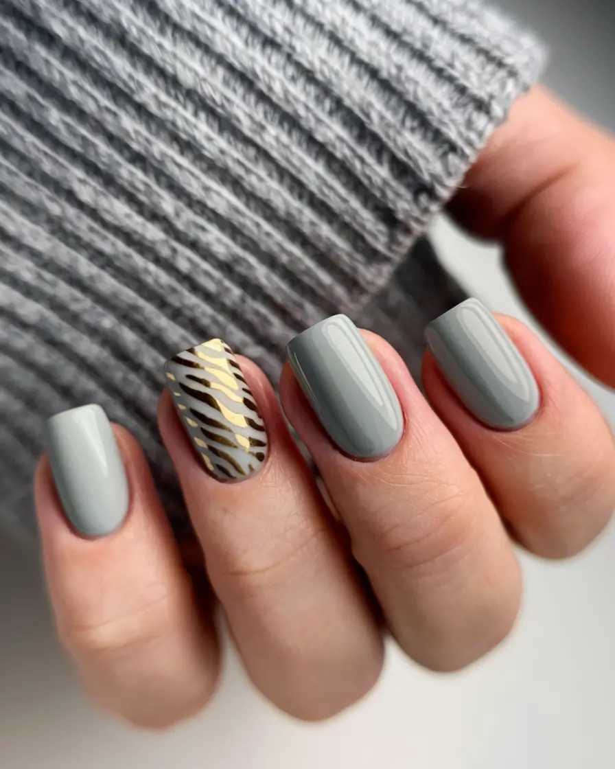 Short Fall Nail Trends 2025 Soft Gray with Golden Zebra Accent