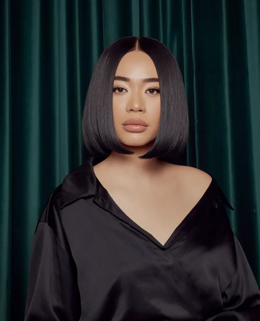 short winter haircuts for women Glossy Precision Bob with Center Part