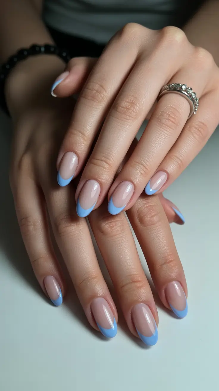 Cute Simple Nail Ideas for Christmas 2025 Frosty Baby Blue French Tips