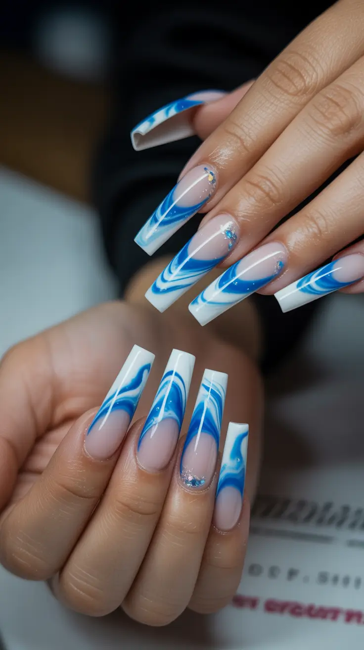 Modern Blue Nails Christmas 2025 Frozen Swirl Coffin Art