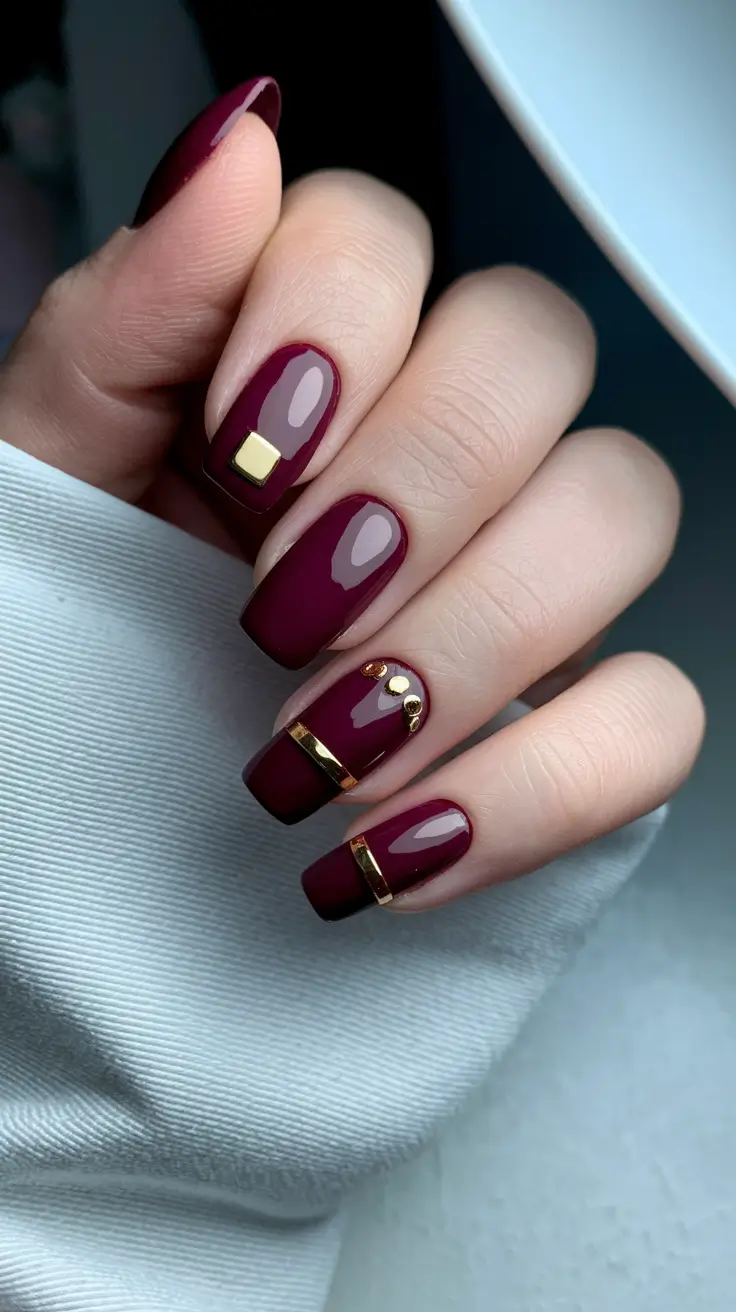Nail Colors for Winter 2025-2026 Velvety Burgundy with Golden Accents