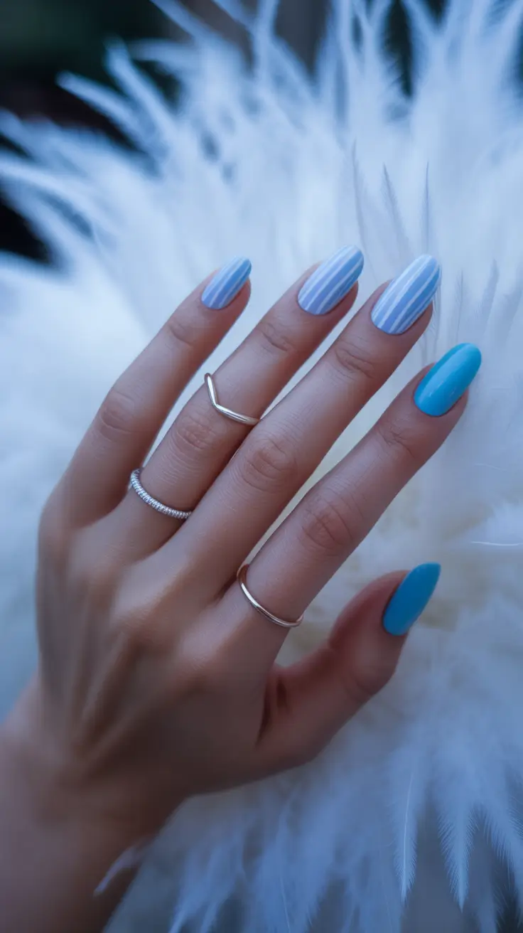 Trendy Blue Winter Nail Looks 2025-2026 - Icy Stripes and Solids