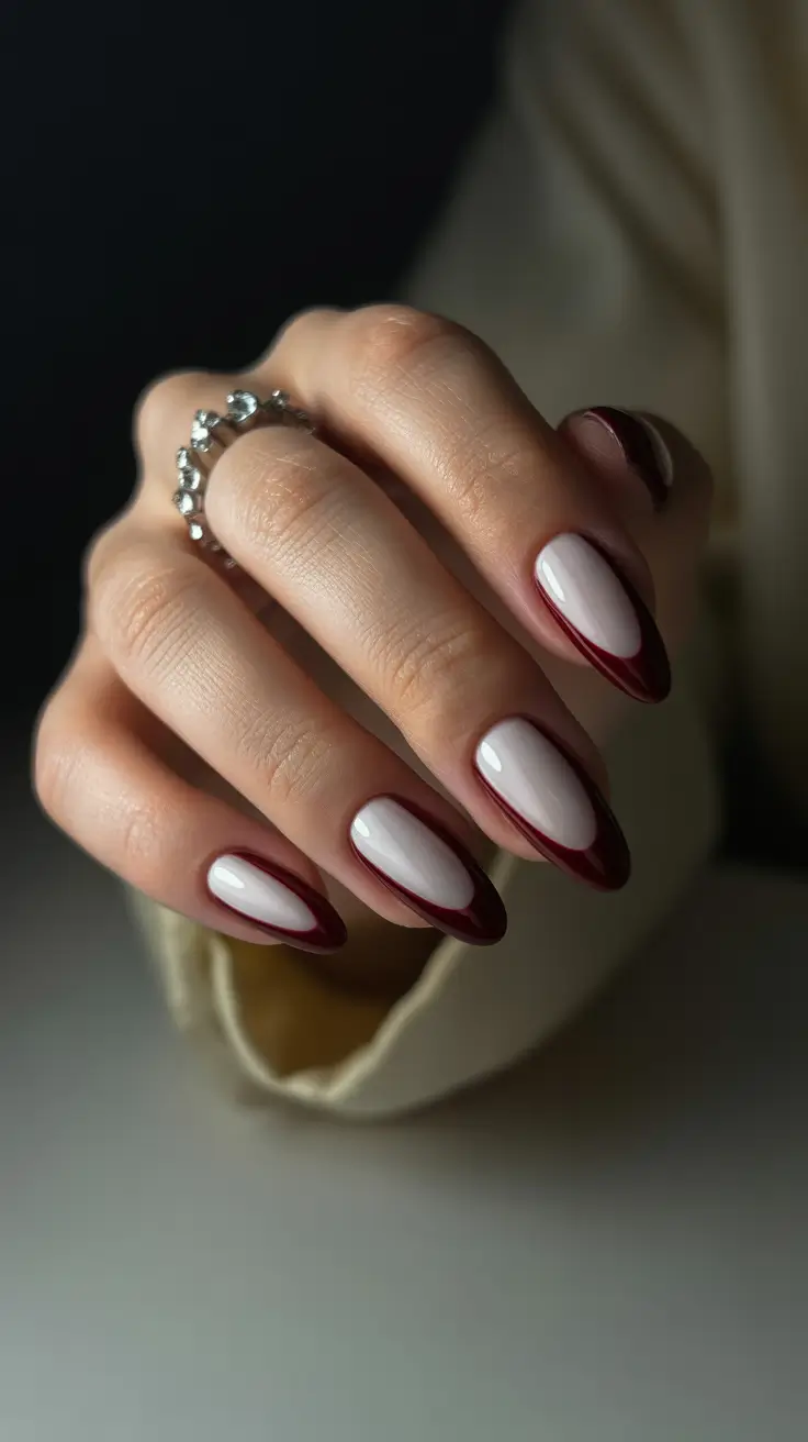 modern nail design 2026 Burgundy Almond Elegance With a Minimalist Edge