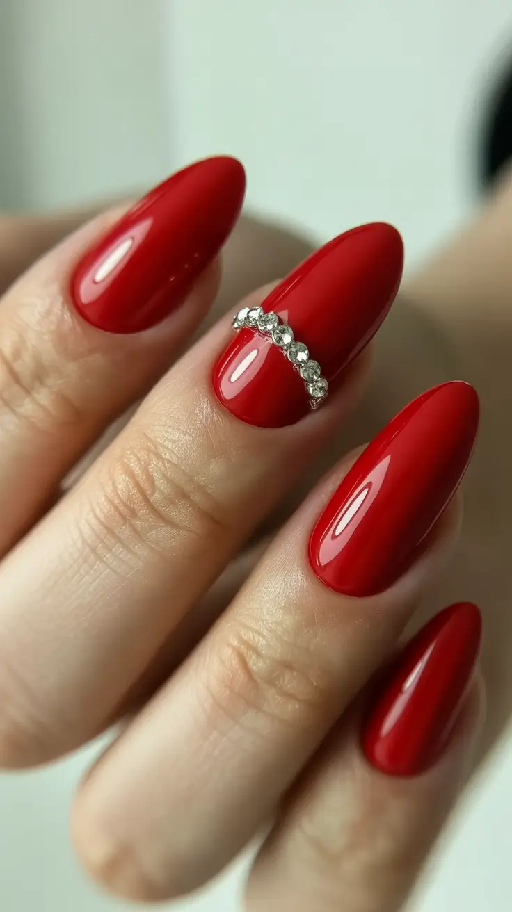 red nails 2026 Glossy Red Almond With Crystal Curve