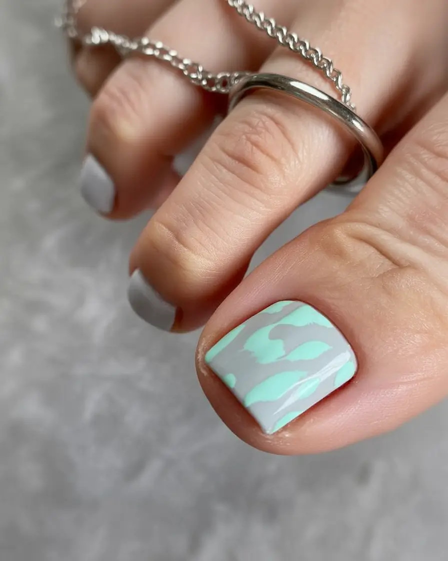 trending pedicure colors 2026 Mint and Grey Camo for Trendy Minimalist Playfulness