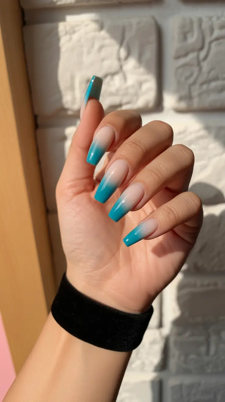 spring nail color ideas 2026 Turquoise Fade Coffin Tips