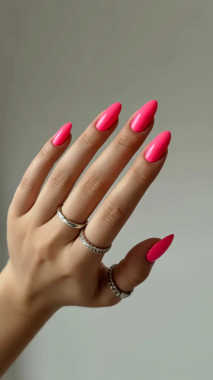 earthy spring nail inspo 2026 Hot Pink Almonds for Bright Spring Moods