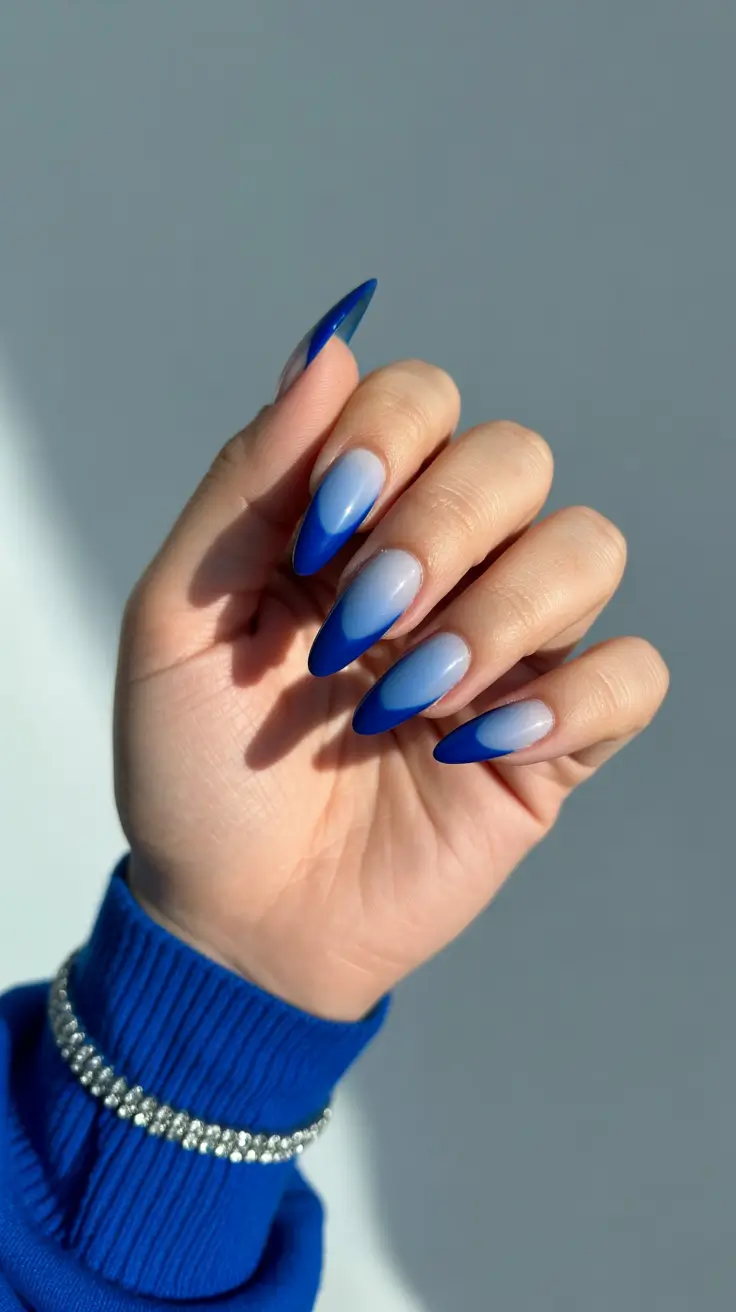 modern colorful spring nails 2026 Cobalt Fade Almond: The New Neutral With Attitude