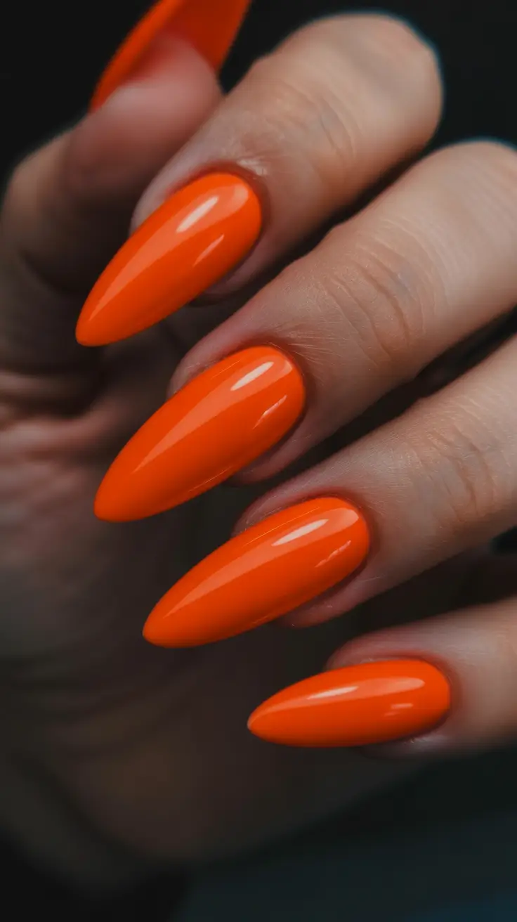 modern colorful spring nails 2026 Electric Orange High-Gloss Stiletto