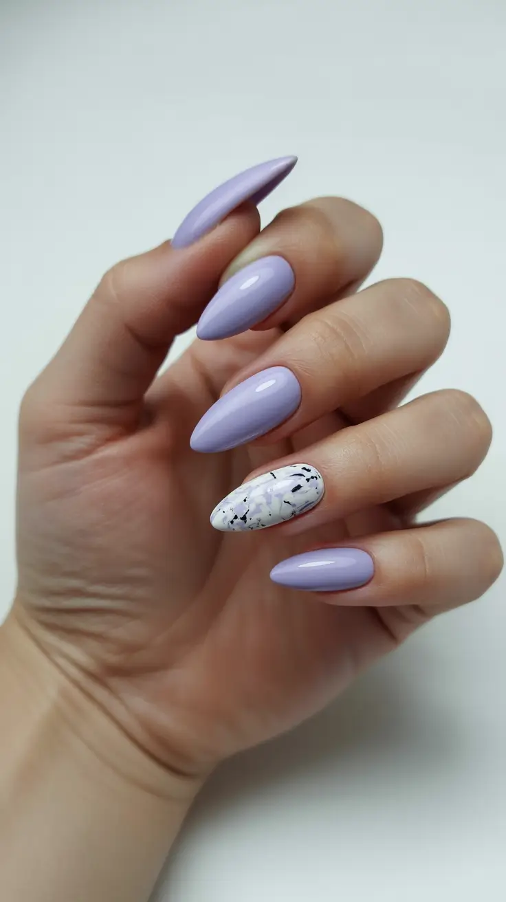 pretty spring nail colors 2026 Soft Lilac with Marble Accent Detail