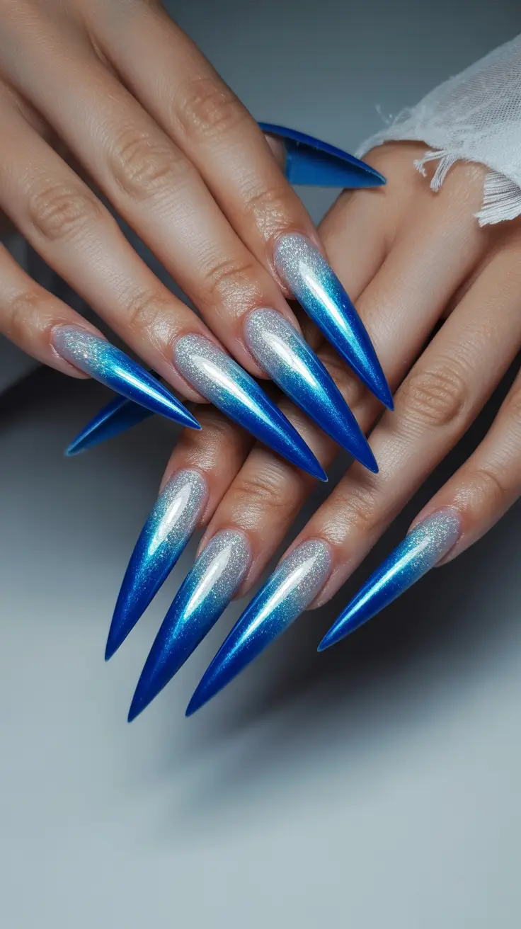 simple fun spring nails 2026 Blue Chrome Ombre Stiletto Drama