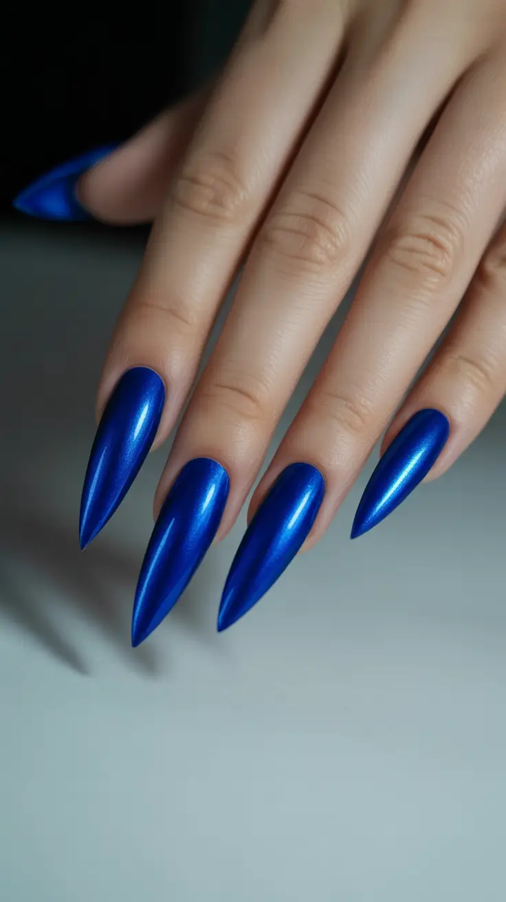 simple fun spring nails 2026 Electric Blue Sculpted Almond