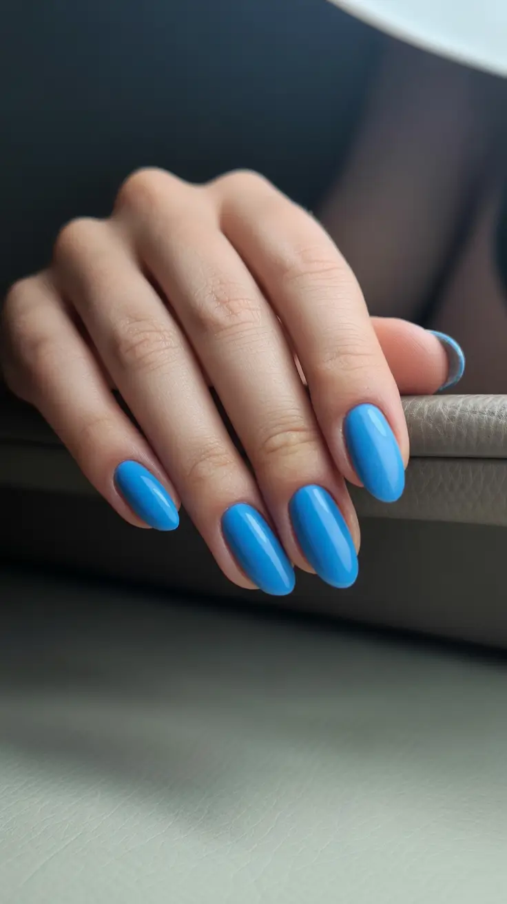 May Nails Ideas 2026 Sky-Blue Almond Elegance for Bright Transitional Days