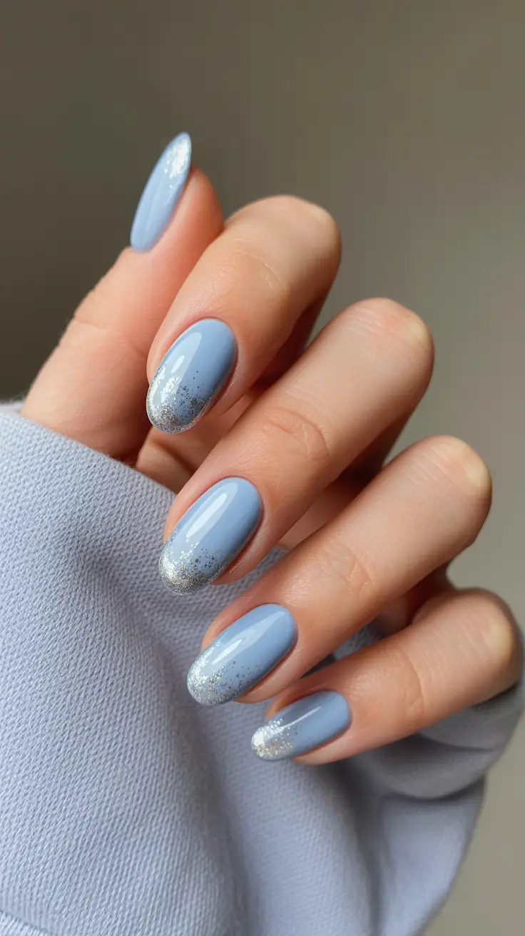 sophisticated spring oval nails 2026 Powder Blue Glitter Fade Serenity