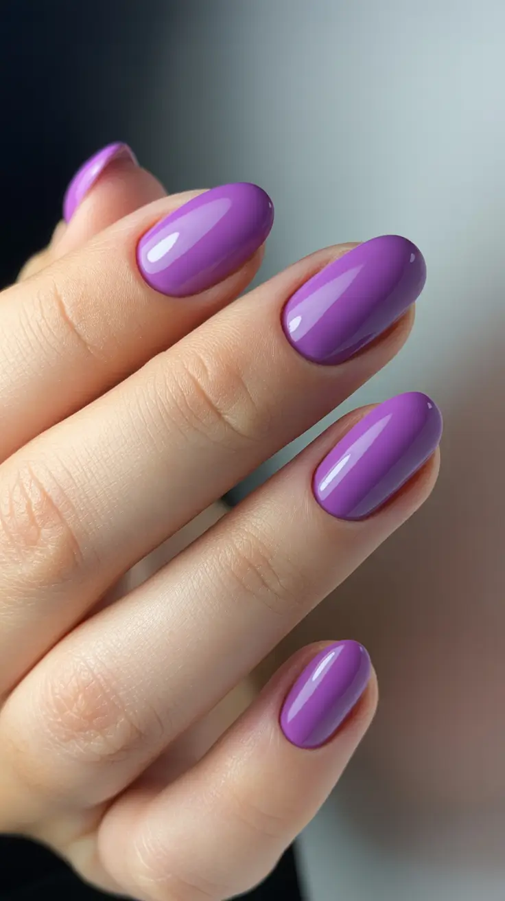 sophisticated spring oval nails 2026 High-Gloss Orchid Minimalist Playfulness