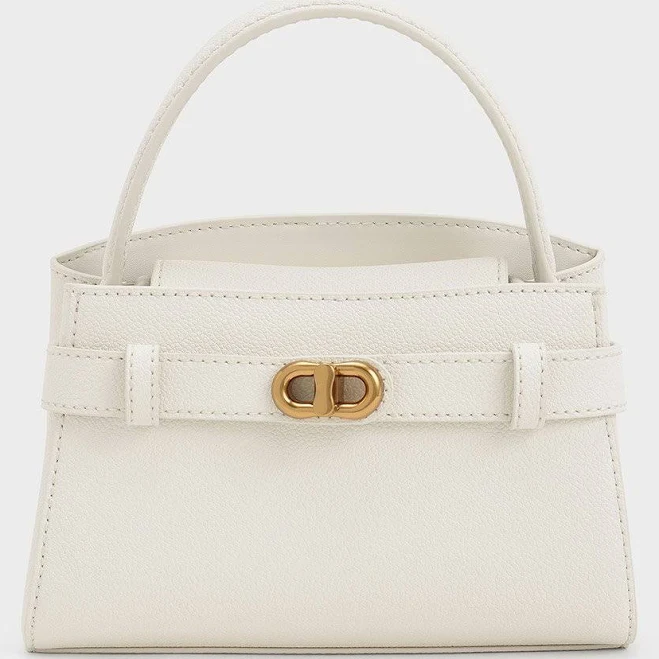 bag Charles & Keith Aubrielle Belted Top Handle Bag charleskeith.com $96