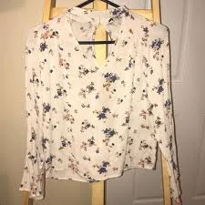 top white blouse with pink and blue flowers Poshmark $20