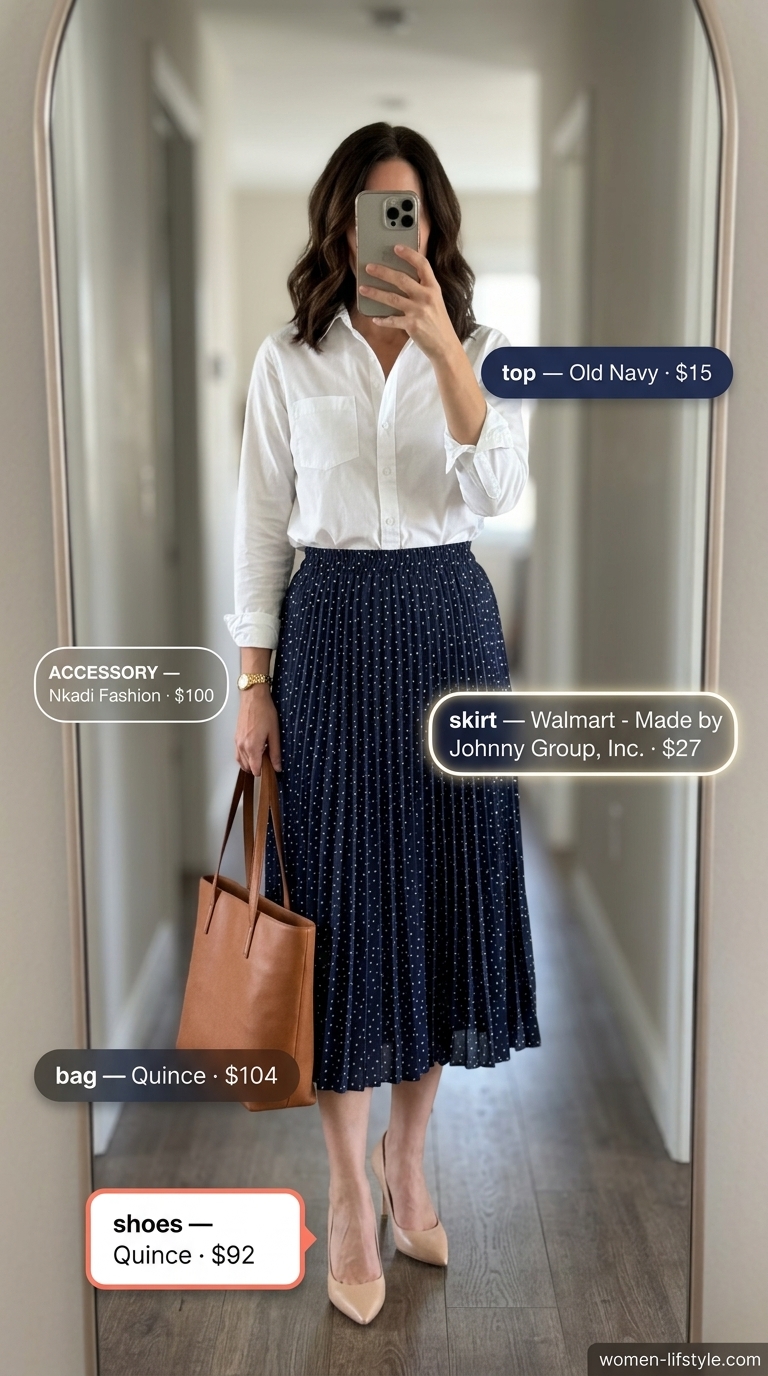 Navy and white polka dot midi skirt with a white button-down for a chic summer office outfit.