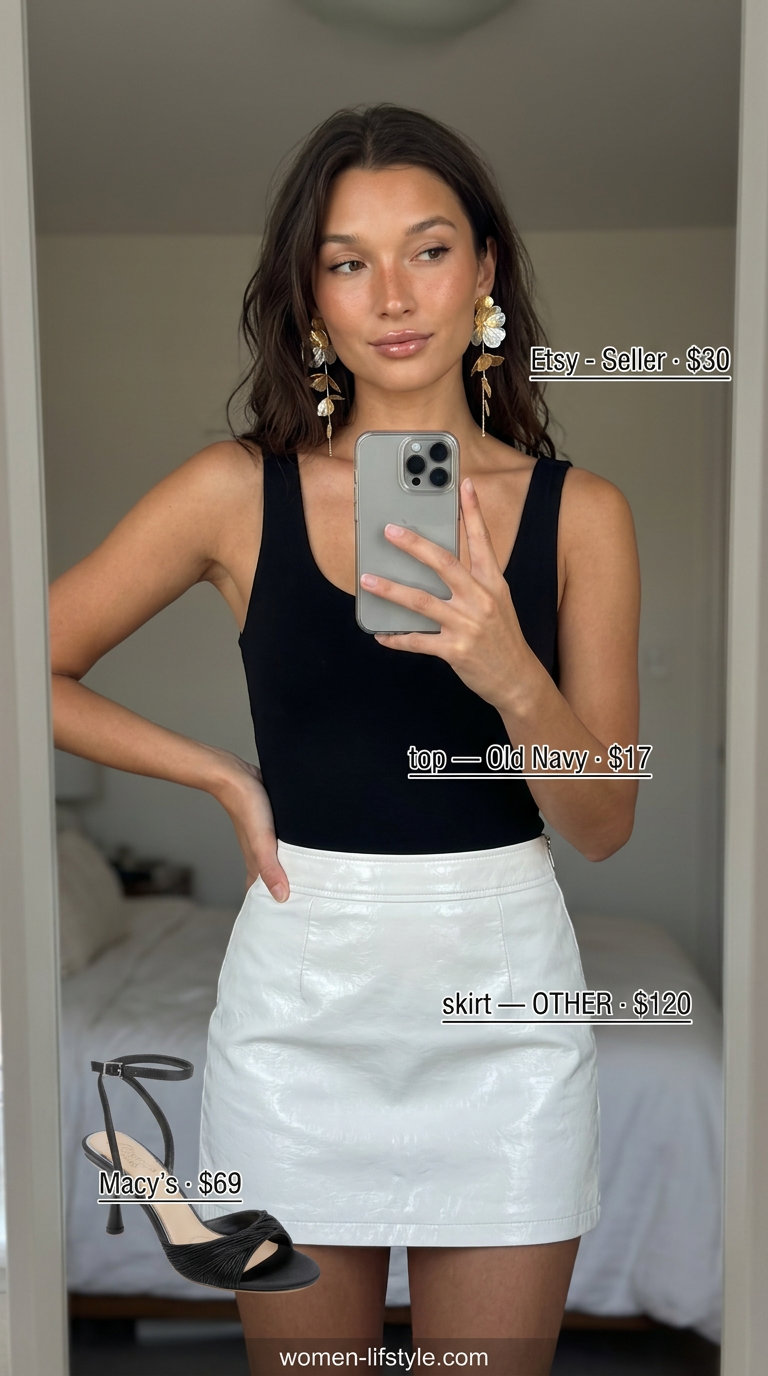 Sophisticated summer ultra-mini outfit: champagne satin skirt, black bodysuit, gold heels & earrings.