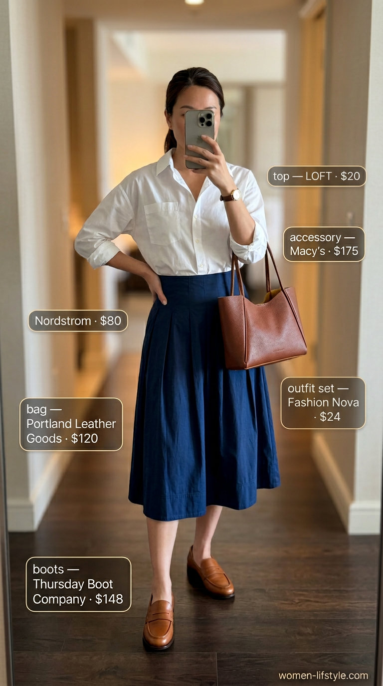Trendy summer night out outfits for women 2026: Navy A-line midi skirt, white oversized shirt, and tan loafers for a polished brunch look.