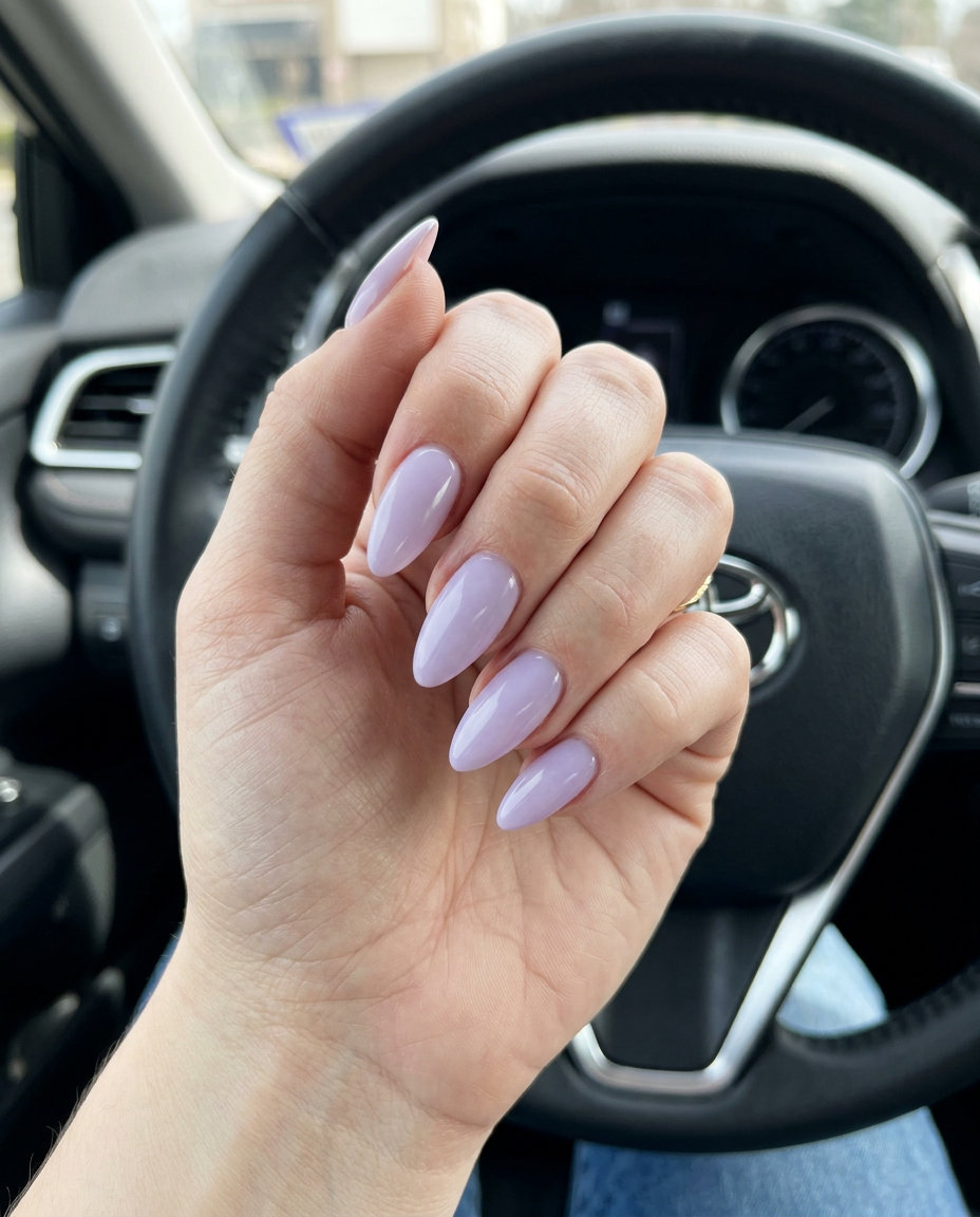 Almond summer nails 2026 for fair skin: Milky lavender with a soft, diffused finish for sophisticated style.