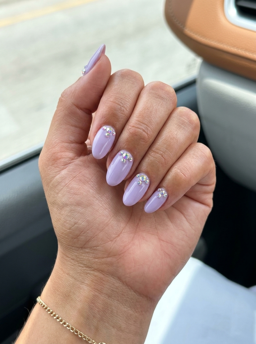 Soft lavender squoval nails with crystal accents for weddings. Colourful summer nails 2026.
