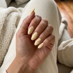 Butter yellow nails with marble effect for June nails ideas 2026, chic for brunch.