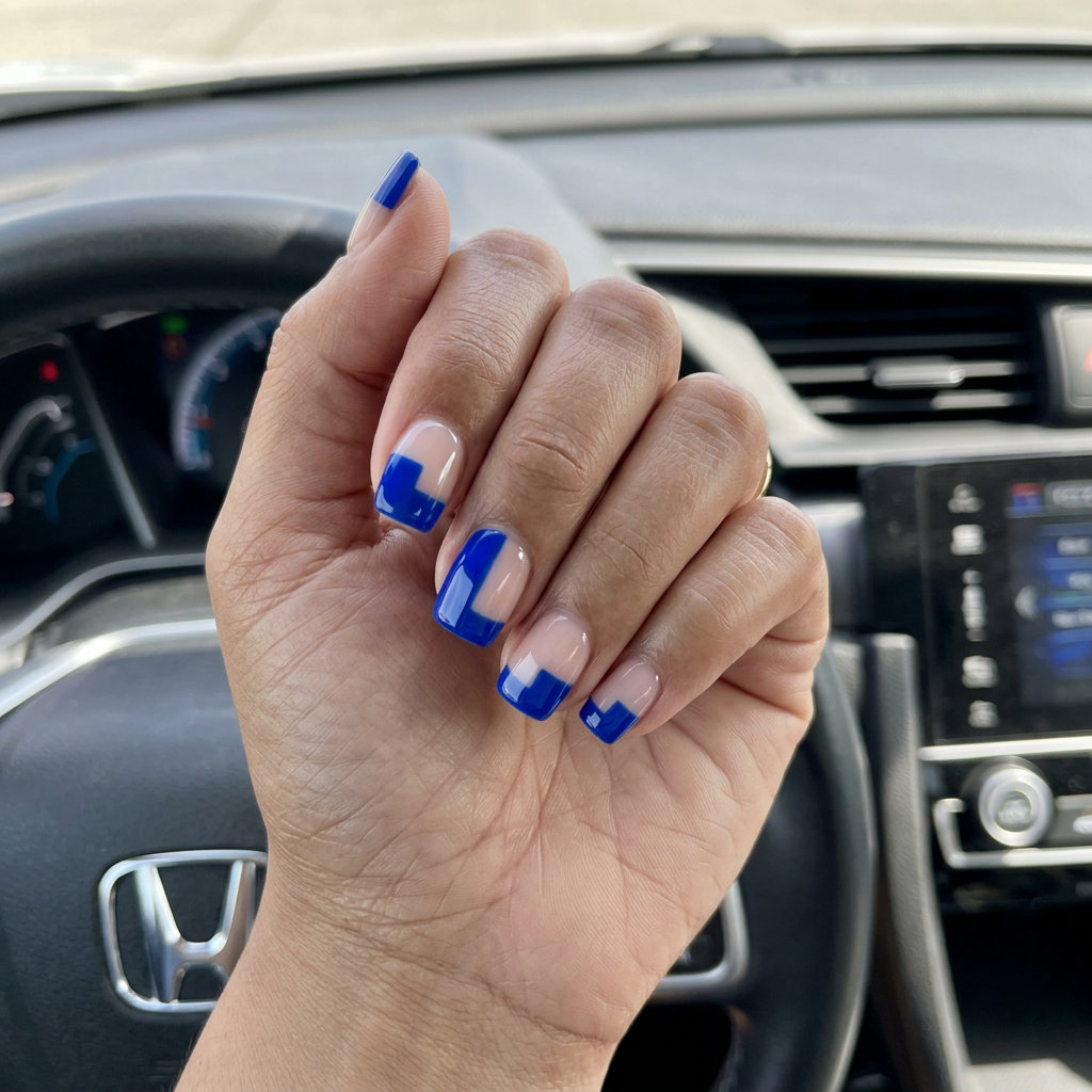 Cobalt blue color block nails on nude base for neon summer nails 2026. Edgy, bold, chic style.
