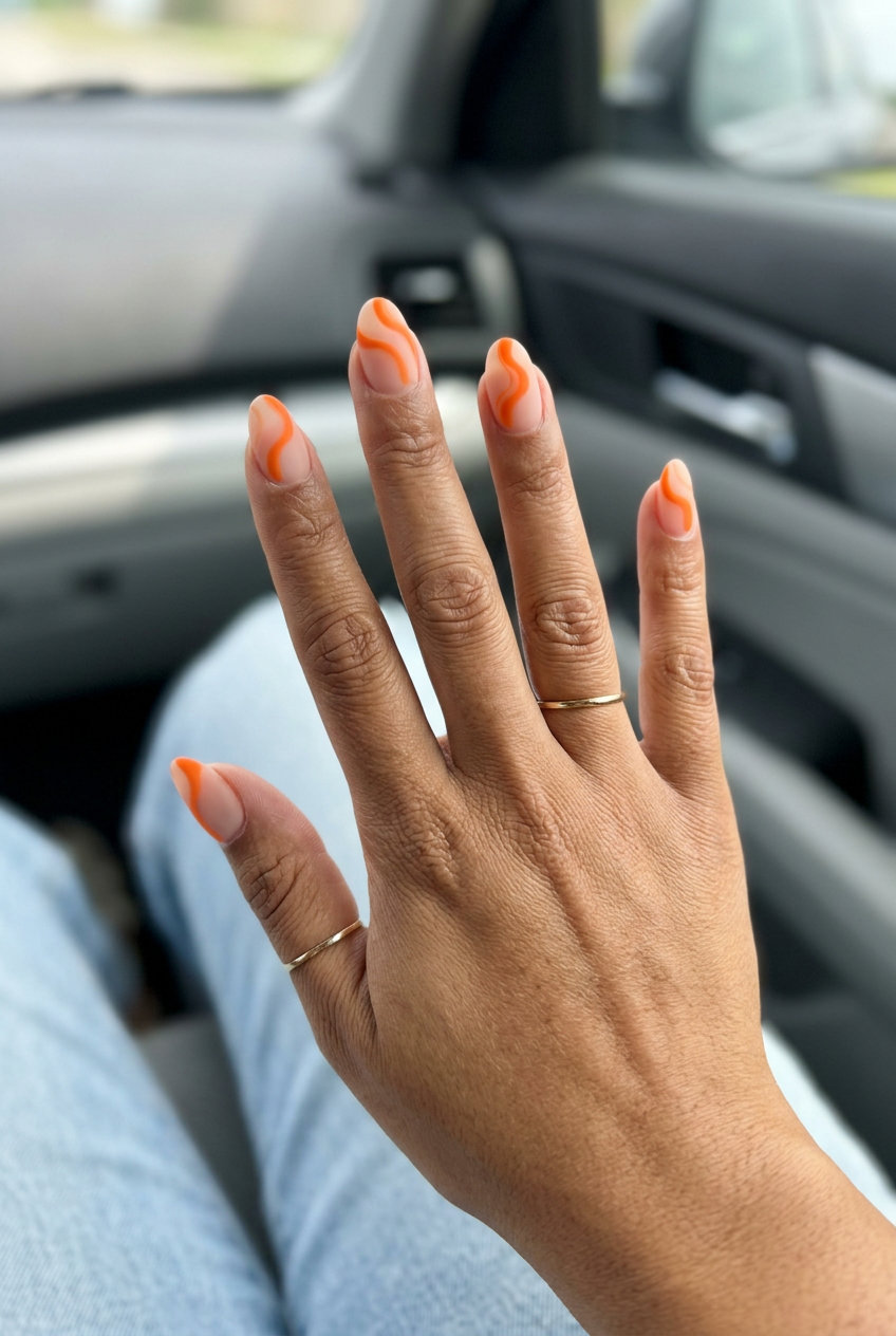 Vivid Orange Matte Swirls nails: bohemian vacation & casual style for neon summer nails 2026.
