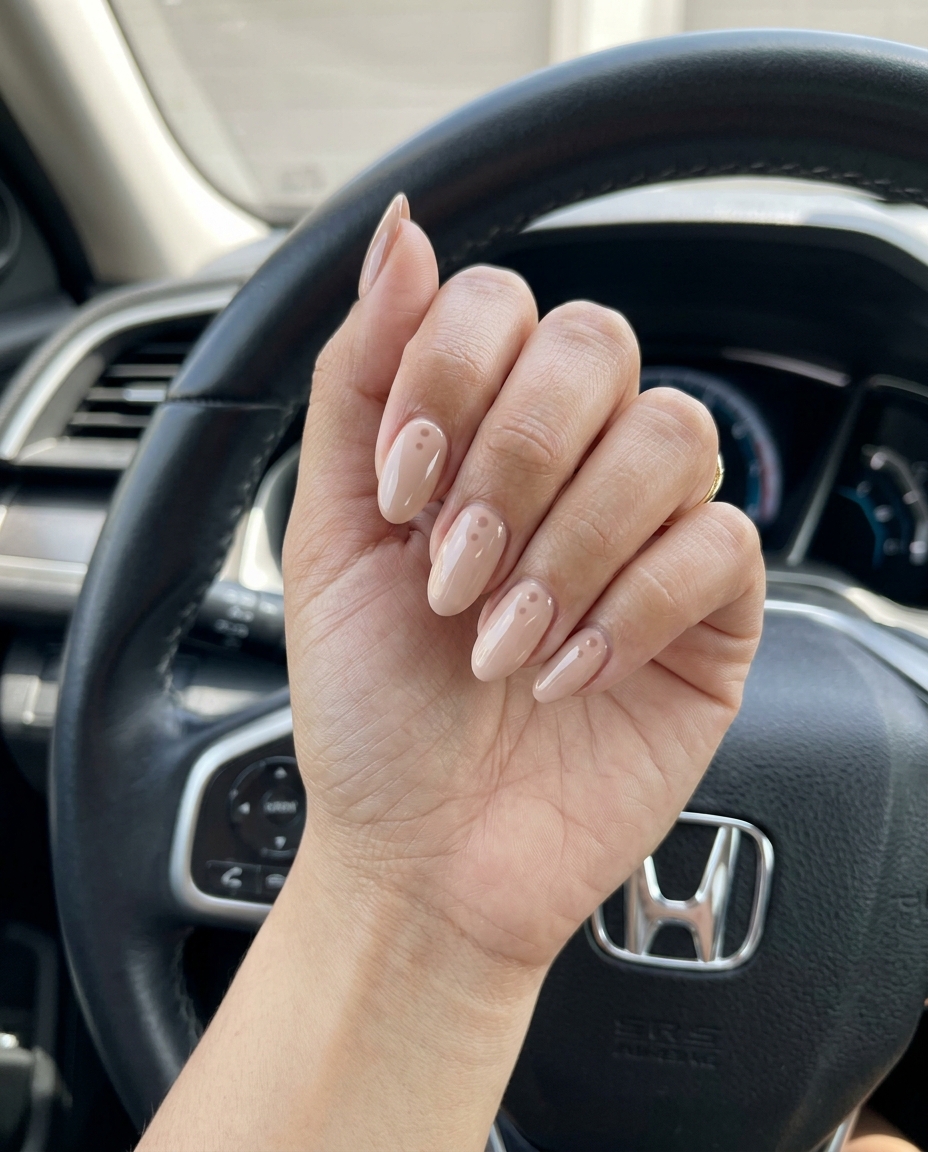 Minimalist Nude Dots Oval nails: sophisticated neutral beige with subtle darker nude dots for daily wear.