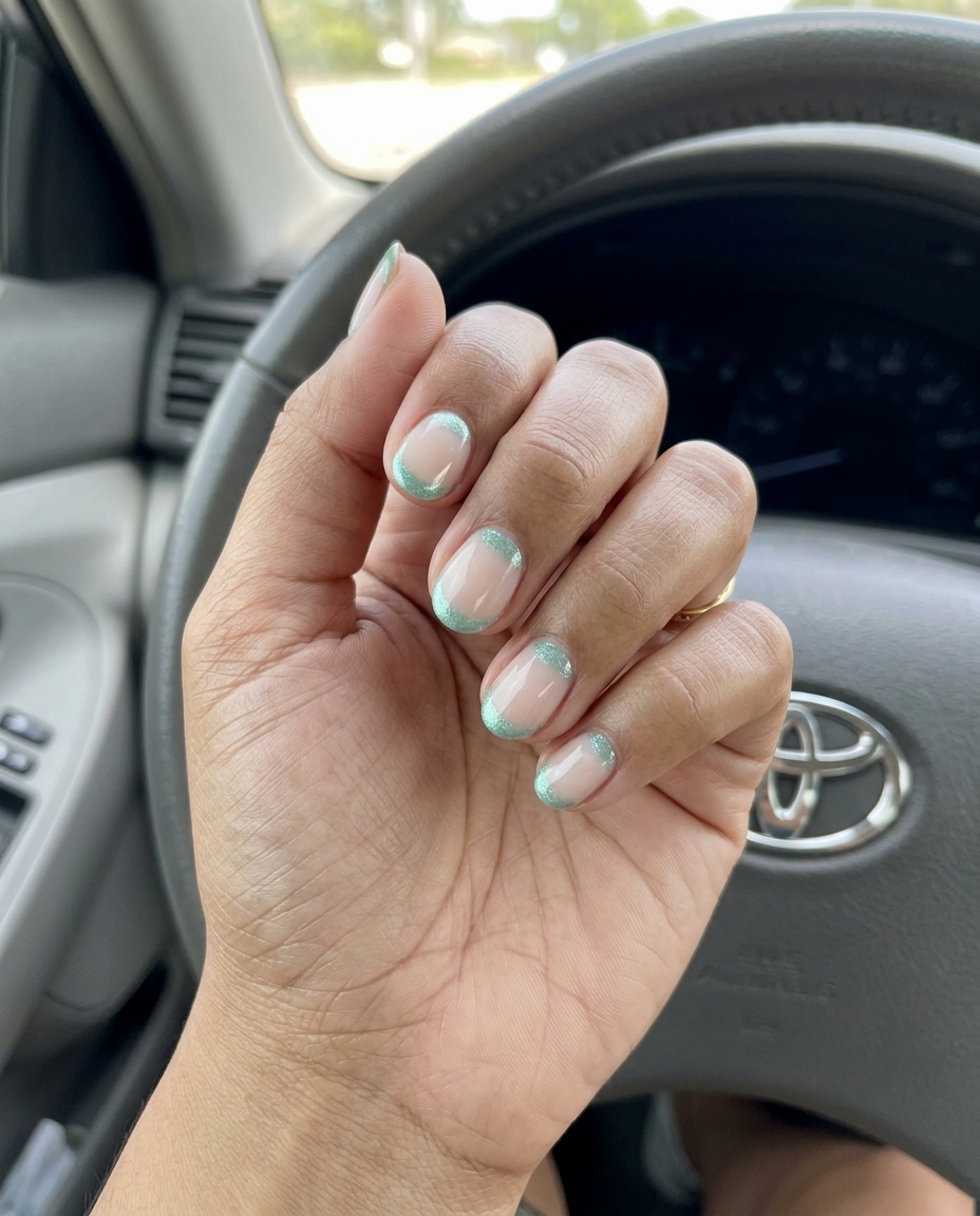 Seafoam Shimmer Half-Moon nails for work, a clean-girl summer glitter nails 2026 accent.