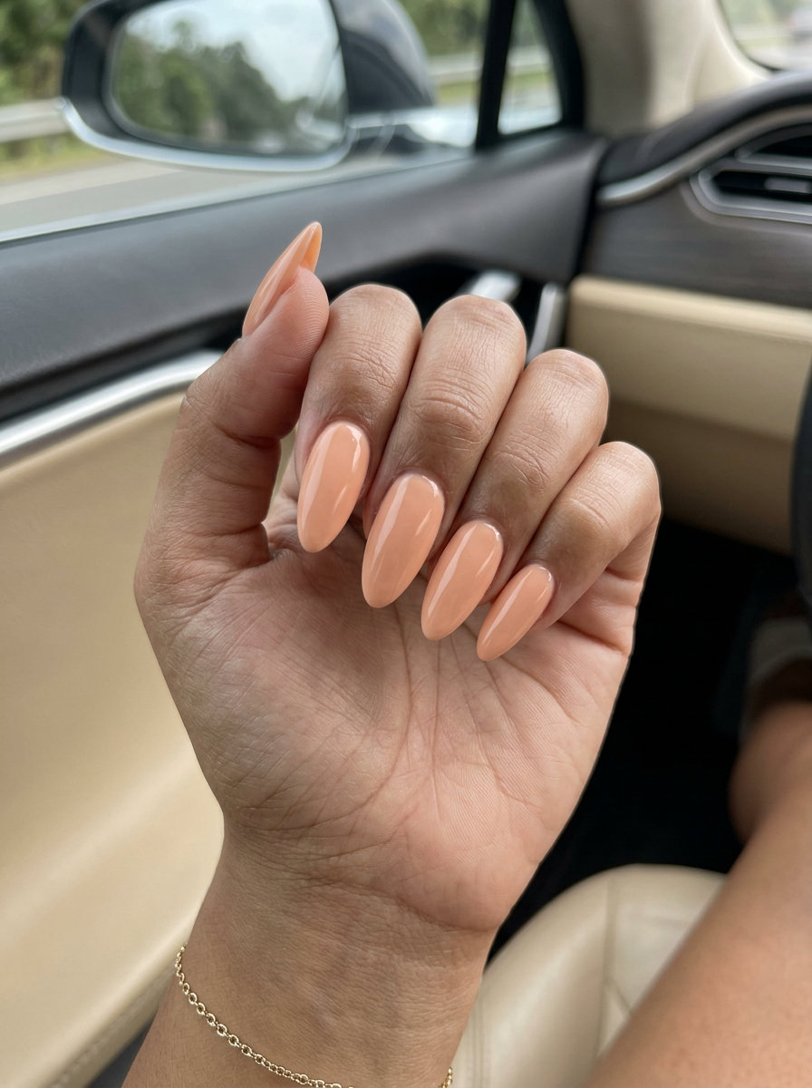 Simple summer nails 2026: Soft peach builder gel extensions. Sophisticated, natural.