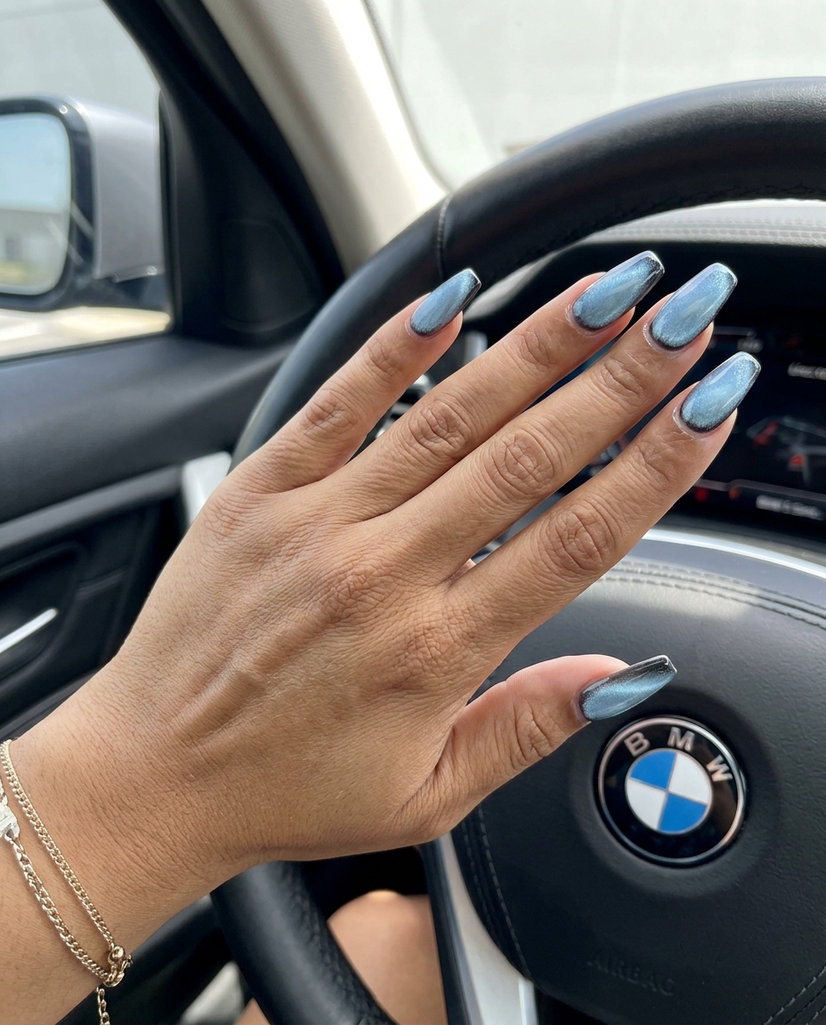 Summer Classy Nails 2026: Celestial Cat-Eye Mysterious celestial cat-eye coffin nails in pale sky blue with silver-blue shift for summer classy nails 2026.