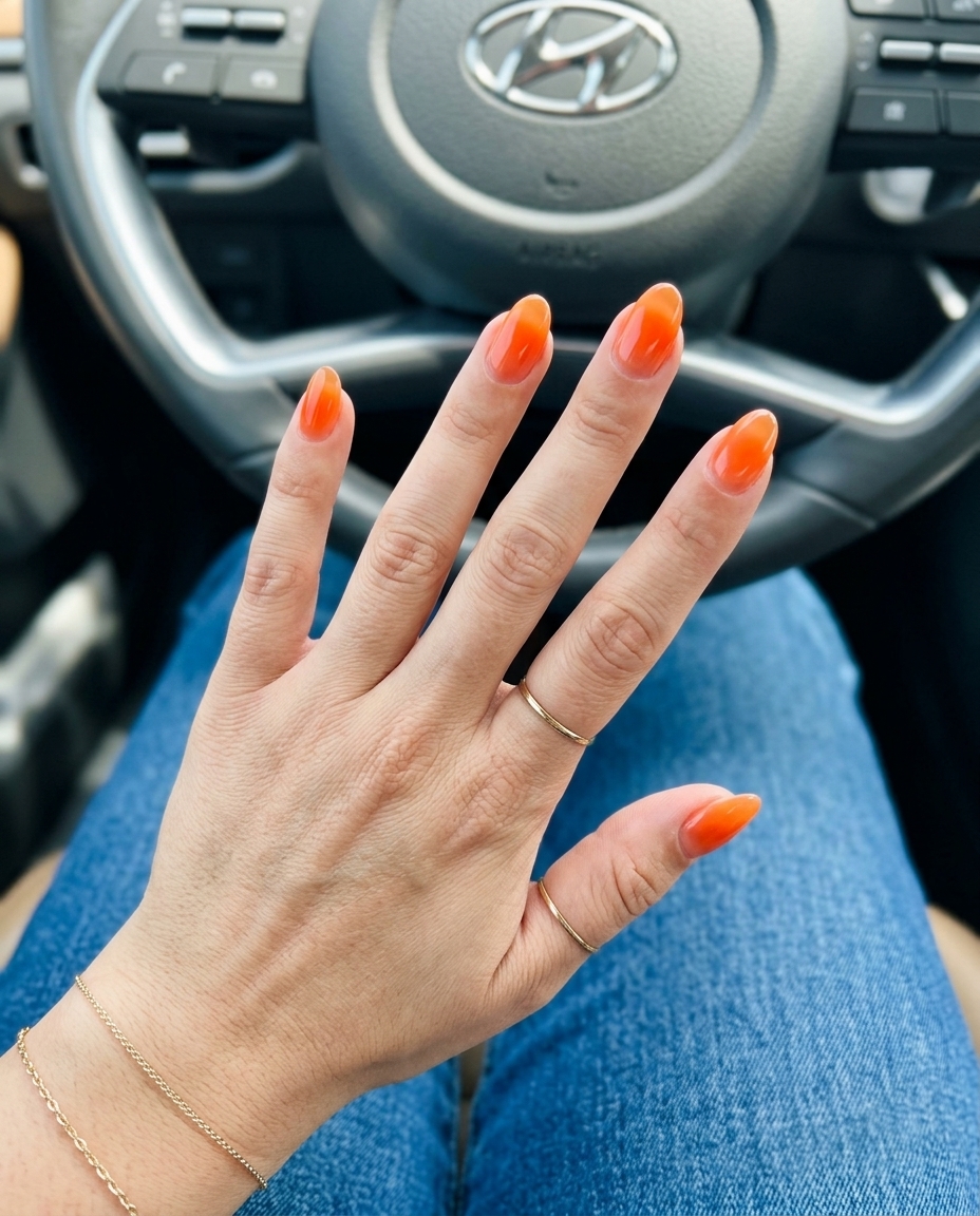 Sun-kissed coral aura oval nails for summer nail manicure ideas 2026. Playful vacation style.