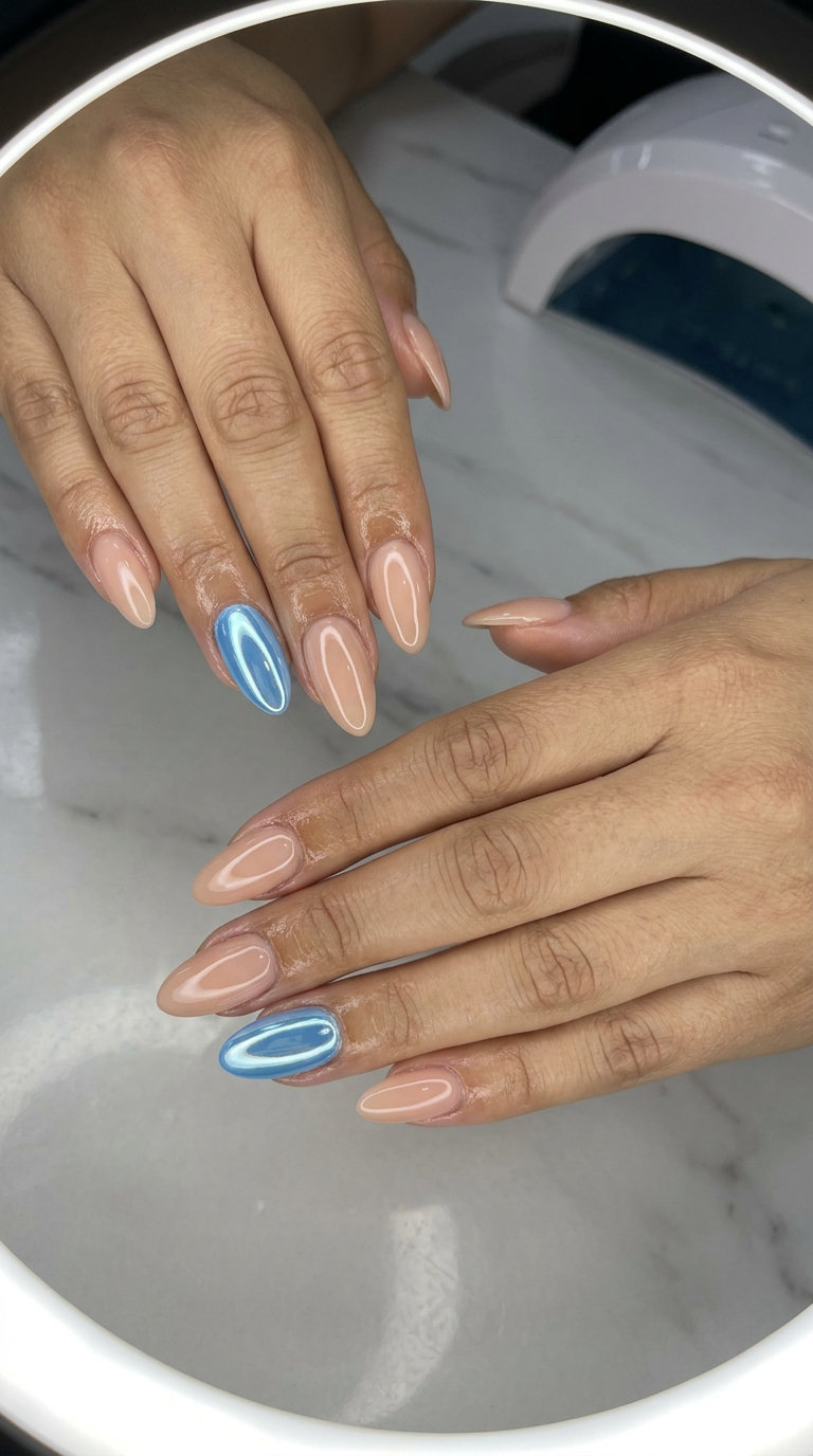 Azure Chrome Accent Nails 2026 | Edgy Party Style Azure chrome accent nails for summer vibes nails 2026. Futuristic & edgy for parties.