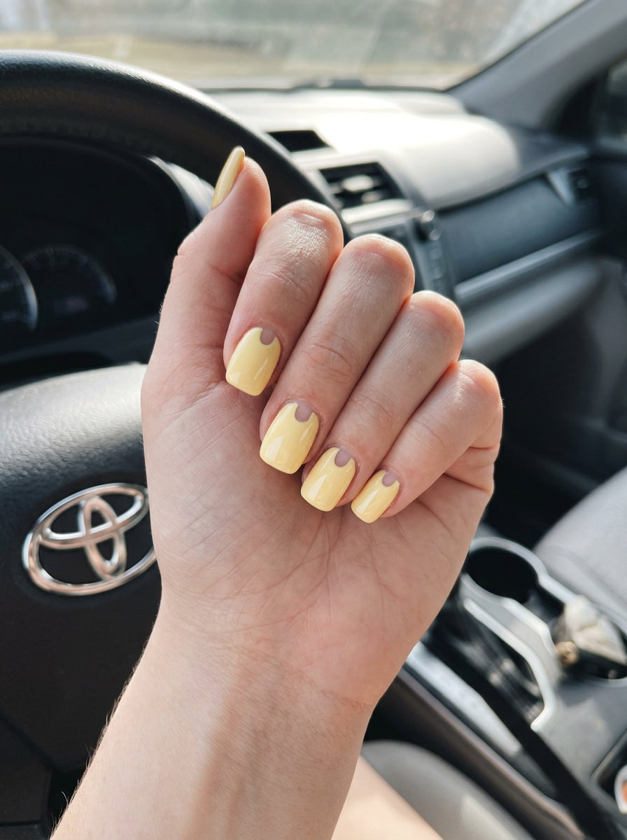 Butter Yellow Negative Space nails: soft yellow gel with natural nail accents for daily wear 2026.