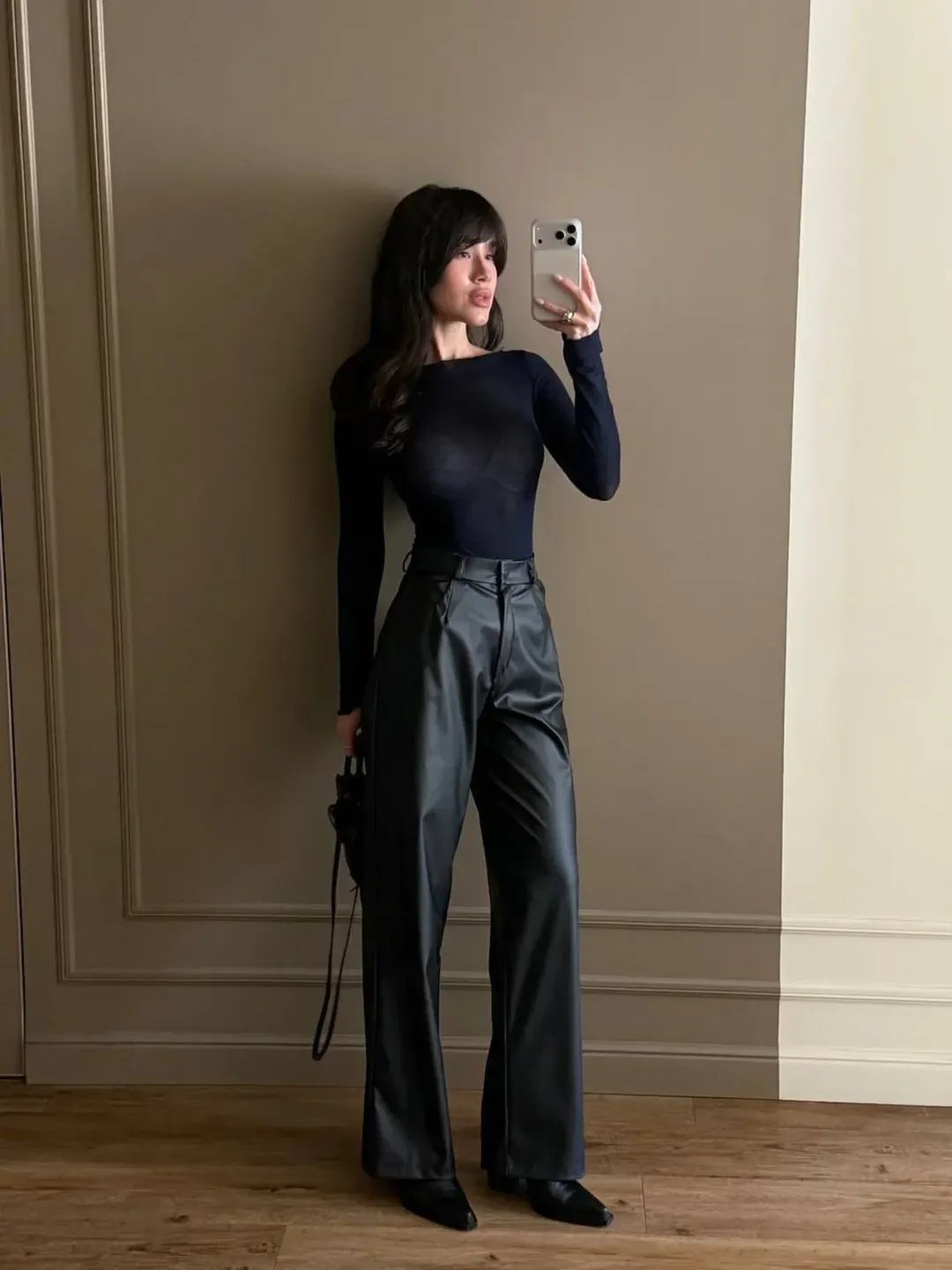 all pants outfits for women 2026 Leather Pants and Fitted Black Layers for a Modern Night-Out Look